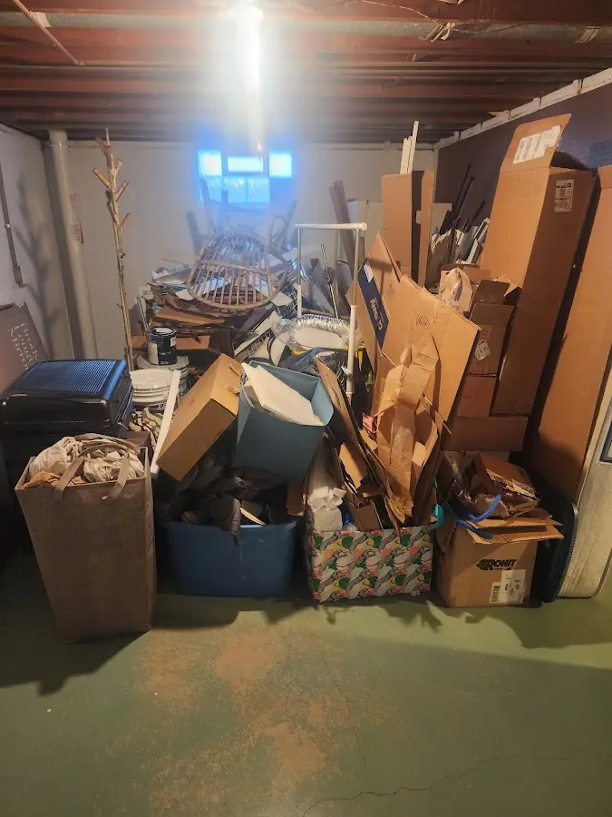 Roll-off dumpster container at job site for 2 Yard Dumpster Rental in Bellevue